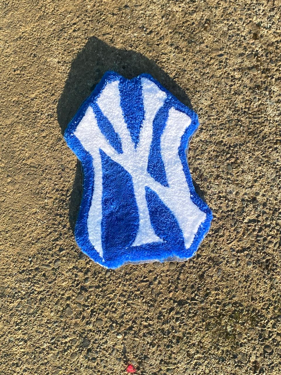 Imagen de Alfombra logo NY